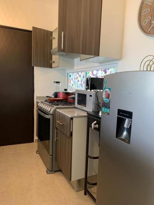 Apartamento exclusivo piscina, jaccuzi, céntrico. Cancún Exterior foto